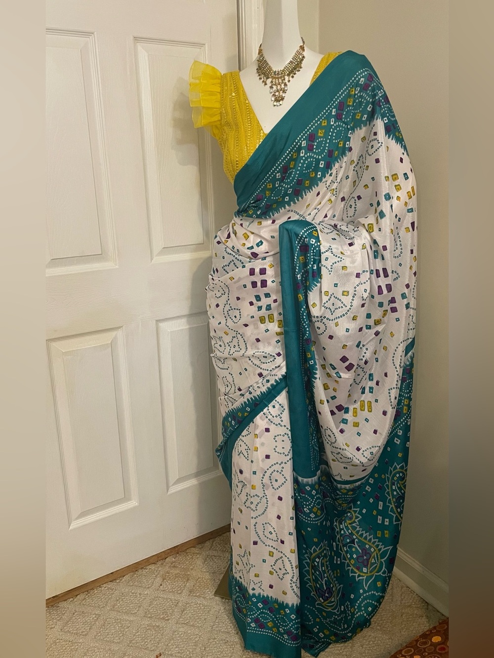 Teal and White Printed Saree with Yellow Blouse Accent
